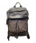 TUMI（トゥミ）の古着「Kinser フラップバックパック」｜ブラック×ブラウン
