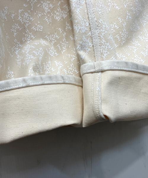YANCHAO（ヤンチャオ）YANCHAO (ヤンチャオ) Tribal Pattern Rubber Printing Denim/トライバルパターンラバープリンティングデニムパンツ アイボリー サイズ:記載なし(実寸参照)の古着・服飾アイテム