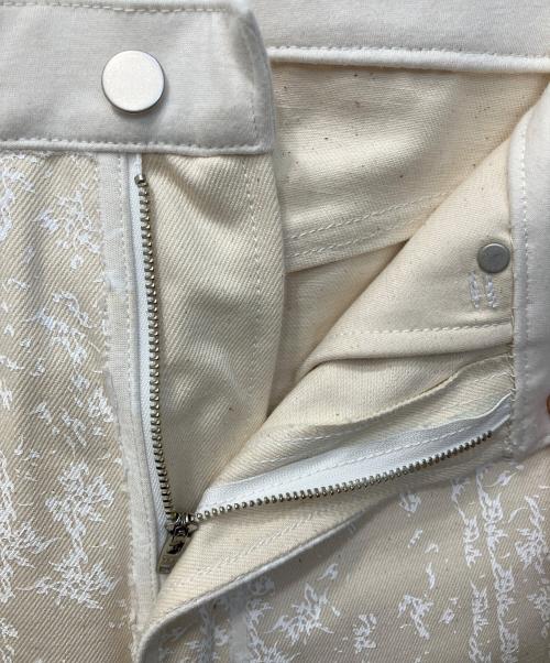 YANCHAO（ヤンチャオ）YANCHAO (ヤンチャオ) Tribal Pattern Rubber Printing Denim/トライバルパターンラバープリンティングデニムパンツ アイボリー サイズ:記載なし(実寸参照)の古着・服飾アイテム
