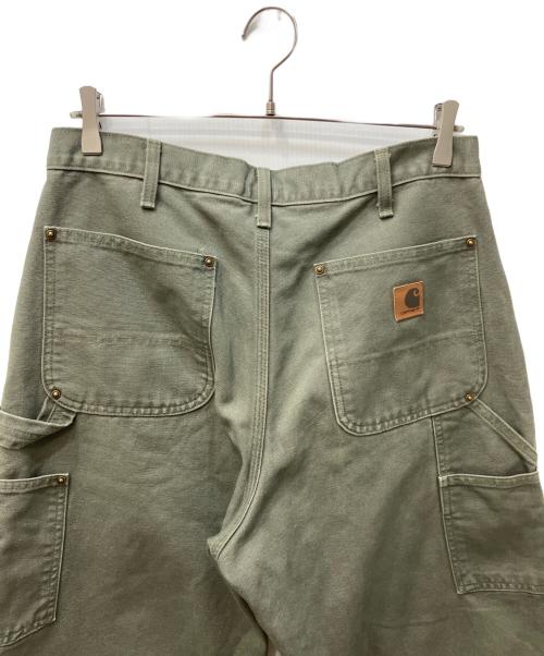 CarHartt（カーハート）CarHartt (カーハート) WASHED-DUCK DOUBLE-FRONT WORK DUNGARE オリーブ サイズ:W32×L36の古着・服飾アイテム