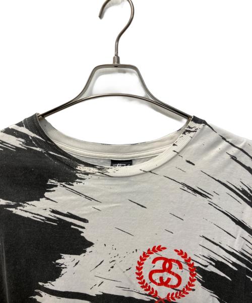 stussy（ステューシー）stussy (ステューシー) オールオーバープリントTシャツ ホワイト×ブラック サイズ:Lの古着・服飾アイテム