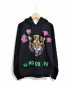 GUCCI（グッチ）の古着「スパンコールタイガー装飾フーディ」｜ブラック