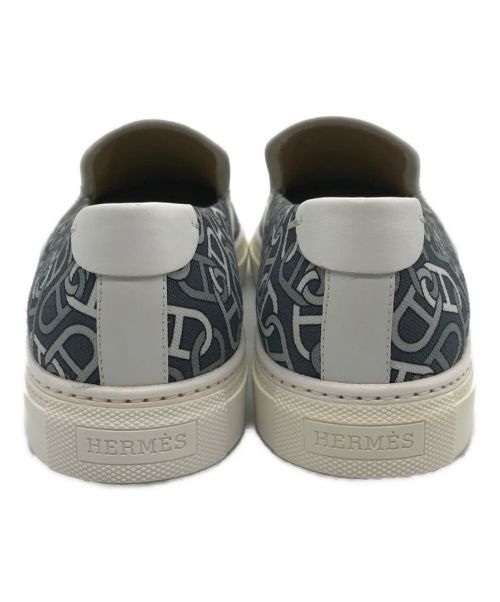 HERMES（エルメス）HERMES (エルメス) ダンクル柄キャンバススリッポン ライトグレー×ホワイト サイズ:41　1/2 未使用品の古着・服飾アイテム