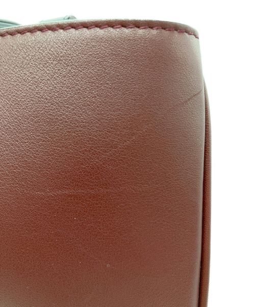 Christian Dior（クリスチャン ディオール）Christian Dior (クリスチャン ディオール) DIORISSIMOバイカラー2WAYバッグ ボルドー×ピンクの古着・服飾アイテム