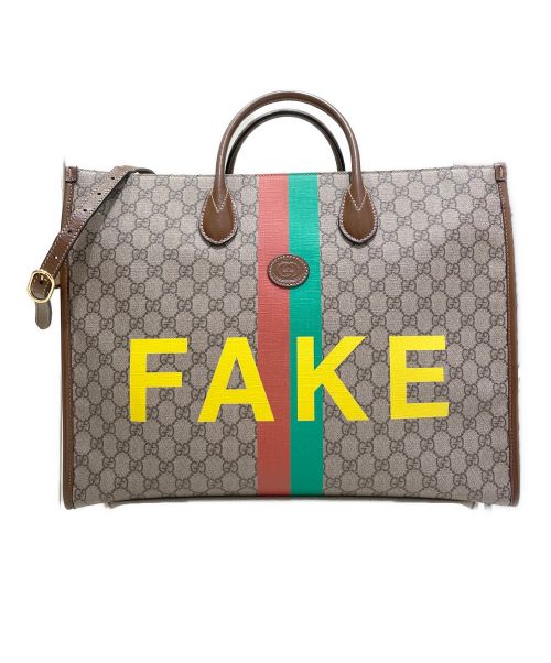 GUCCI（グッチ）GUCCI (グッチ) FAKE/NOTプリントラージトートバッグ ベージュの古着・服飾アイテム