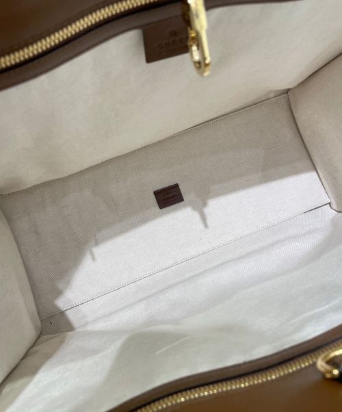 GUCCI（グッチ）GUCCI (グッチ) FAKE/NOTプリントラージトートバッグ ベージュの古着・服飾アイテム