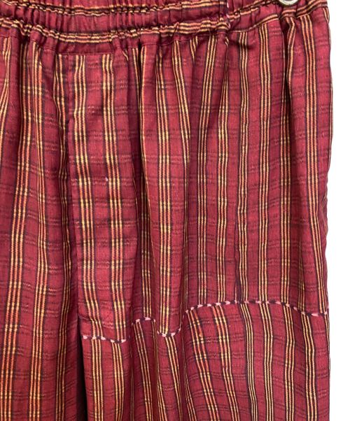 COMME des GARCONS HOMME PLUS（コムデギャルソンオムプリュス）COMME des GARCONS HOMME PLUS (コムデギャルソンオムプリュス) 92SS エスニック期 転写プリントワイドパンツ/Archive レッド×イエロー サイズ:Mの古着・服飾アイテム
