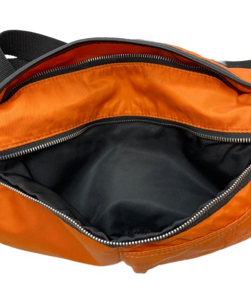 Maison Margiela（メゾンマルジェラ）Maison Margiela (メゾンマルジェラ) ボディーバッグ オレンジの古着・服飾アイテム