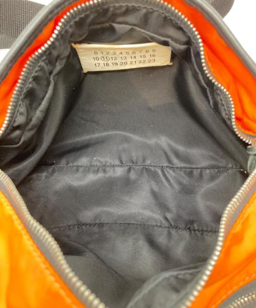 Maison Margiela（メゾンマルジェラ）Maison Margiela (メゾンマルジェラ) ボディーバッグ オレンジの古着・服飾アイテム