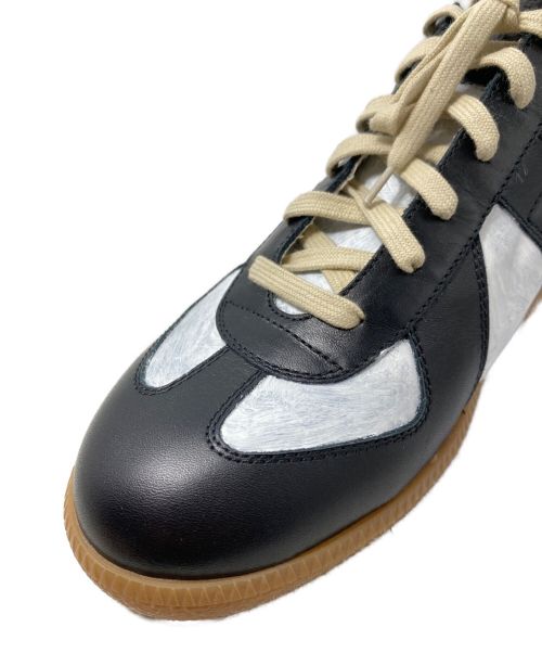 Maison Margiela（メゾンマルジェラ）Maison Margiela (メゾンマルジェラ) ペイント加工ジャーマントレーナー ブラック×ホワイト サイズ:42の古着・服飾アイテム