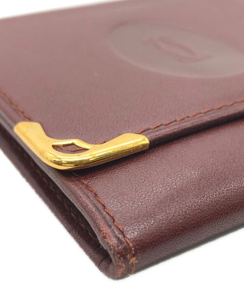 Cartier（カルティエ）Cartier (カルティエ) コインケース ボルドーの古着・服飾アイテム