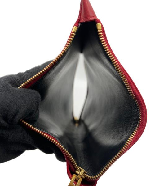 Saint Laurent Paris（サンローランパリ）Saint Laurent Paris (サンローランパリ) クラッチバッグ レッドの古着・服飾アイテム