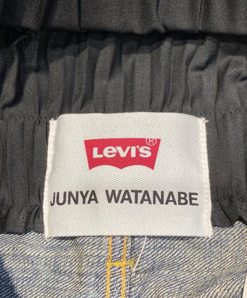 JUNYA WATANABE COMME des GARCONS（ジュンヤワタナベ コムデギャルソン）JUNYA WATANABE COMME des GARCONS (ジュンヤワタナベ コムデギャルソン) LEVI'S (リーバイス) AD2021 再構築プリーツレイヤードデニムパンツ インディゴ サイズ:Sの古着・服飾アイテム