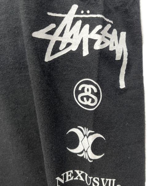 stussy（ステューシー）stussy (ステューシー) NEXUSVII (ネクサスセブン) プリントTシャツ ブラック サイズ:Mの古着・服飾アイテム