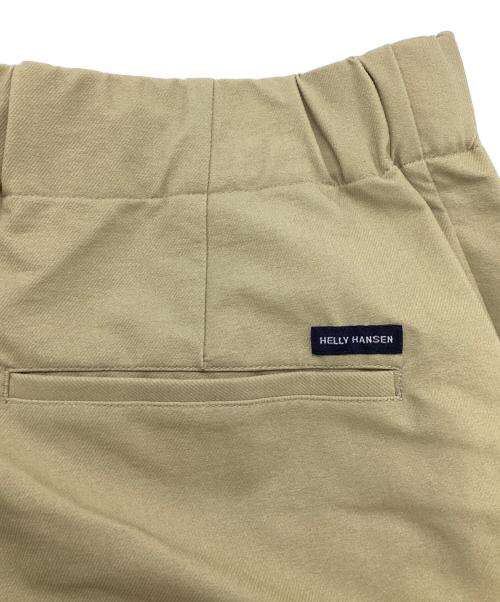 HELLY HANSEN（ヘリーハンセン）HELLY HANSEN (ヘリーハンセン) ストーレンツータックパンツ ベージュ サイズ:Mの古着・服飾アイテム