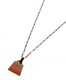 HERMES（エルメス）の古着「アミュレットケリーラッカーGM」｜オレンジ