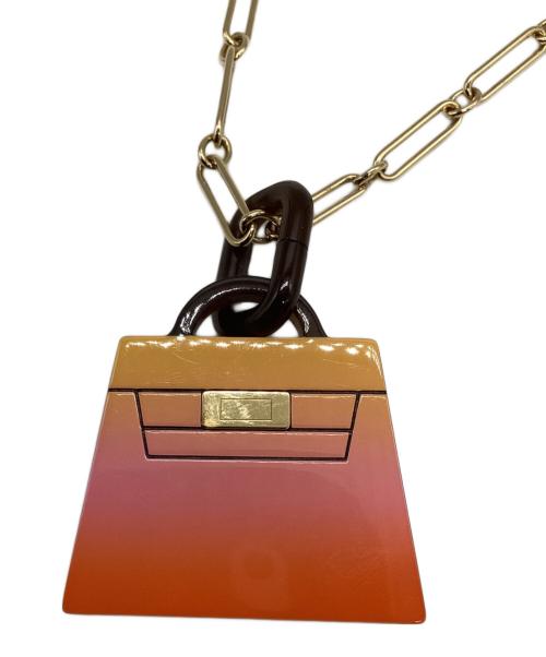 HERMES（エルメス）HERMES (エルメス) アミュレットケリーラッカーGM オレンジの古着・服飾アイテム