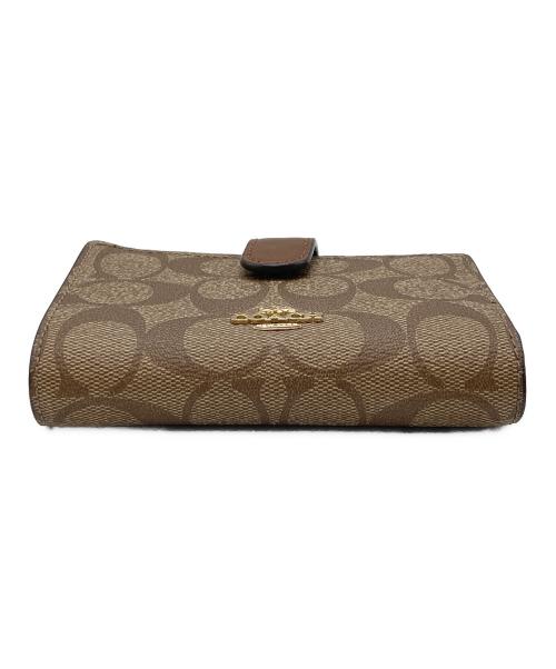 COACH（コーチ）COACH (コーチ) 2つ折り財布 F23553 ブラウンの古着・服飾アイテム