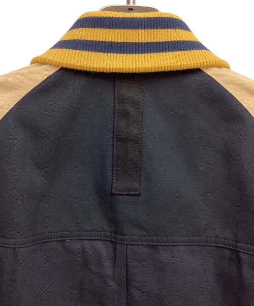 COMME des GARCONS JUNYA WATANABE MAN（コム デ ギャルソン ジュンヤ ワタナベ マン）COMME des GARCONS JUNYA WATANABE MAN (コム デ ギャルソン ジュンヤ ワタナベ マン) CarHartt (カーハート) VARSITY JACKET(ヴァーシティジャケット) ネイビー サイズ:XSの古着・服飾アイテム