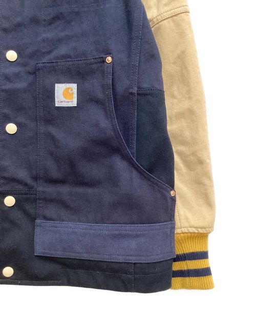COMME des GARCONS JUNYA WATANABE MAN（コム デ ギャルソン ジュンヤ ワタナベ マン）COMME des GARCONS JUNYA WATANABE MAN (コム デ ギャルソン ジュンヤ ワタナベ マン) CarHartt (カーハート) VARSITY JACKET(ヴァーシティジャケット) ネイビー サイズ:XSの古着・服飾アイテム
