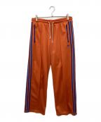 adidasアディダス）の古着「アディカラー 70s モントリオール トラックパンツ」｜オレンジ