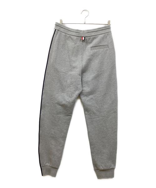 Thom Browne（トムブラウン）Thom Browne (トムブラウン) ループバックストライプスウェットパンツ グレー サイズ:Mの古着・服飾アイテム