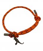 Yves Saint Laurentイヴサンローラン）の古着「ダイナソーブレスレット」｜オレンジ