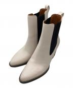 COACHコーチ）の古着「ピアスブーティ　CC786」｜アイボリー