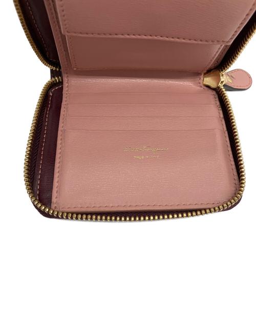Salvatore Ferragamo（サルヴァトーレ フェラガモ）Salvatore Ferragamo (サルヴァトーレ フェラガモ) ガンチーニ 2つ折りラウンドジップ財布 バーガンディーの古着・服飾アイテム
