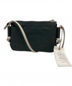 豊岡鞄トヨオカカバン）の古着「TUTUMU お散歩WALLET」｜グリーン