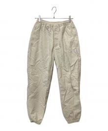 uniform experiment（ユニフォームエクスペリメント）の古着「SUPPLEX LOOSE FIT JOGGER PANTS」｜アイボリー