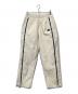 Unknown（アンノーン）の古着「Cream Tonal Zip Track Pants」｜アイボリー