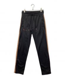 MARCELO BURLON（マルセロバーロン）の古着「トラックパンツ」｜ブラック