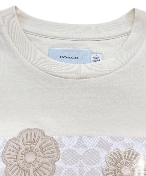 COACH（コーチ）COACH (コーチ) ティー ローズ Tシャツ アイボリー サイズ:Mの古着・服飾アイテム