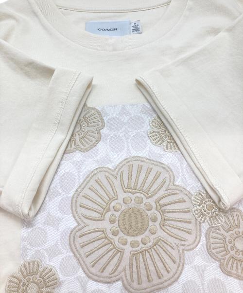 COACH（コーチ）COACH (コーチ) ティー ローズ Tシャツ アイボリー サイズ:Mの古着・服飾アイテム