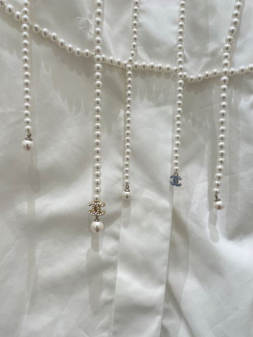 CHANEL（シャネル）CHANEL (シャネル) ココマークパールエンベリッシュメントシャツ ホワイト サイズ:40の古着・服飾アイテム