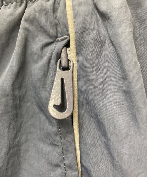 NIKE（ナイキ）NIKE (ナイキ) SOLO SWOOSH TRACK PANT　FB8621-437 ネイビー サイズ:XLの古着・服飾アイテム