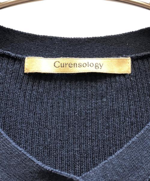 Curensology（カレンソロジー）Curensology (カレンソロジー) ボタンアキギャザーニットワンピース ブラック サイズ:FREEの古着・服飾アイテム