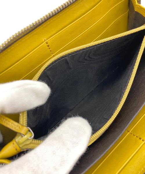 GUCCI（グッチ）GUCCI (グッチ) 長財布 イエローの古着・服飾アイテム