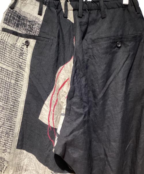 Yohji Yamamoto pour homme（ヨウジヤマモト プールオム）Yohji Yamamoto pour homme (ヨウジヤマモト プールオム) YUUKA ASAKURA LINEN NEWSPAPER PRINT TWO TONE PANTS ブラック サイズ:2の古着・服飾アイテム