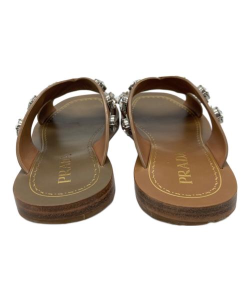 PRADA（プラダ）PRADA (プラダ) ビジュークロスサンダル キャメル サイズ:35の古着・服飾アイテム