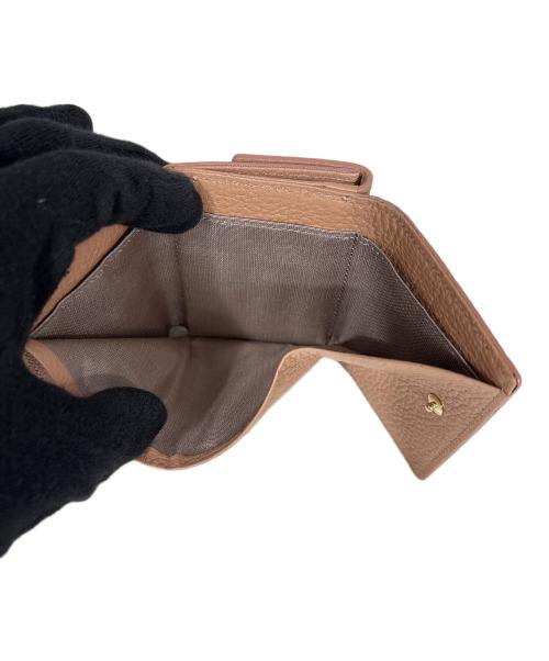 russet（ラシット）russet (ラシット) 3つ折り財布 ベージュの古着・服飾アイテム