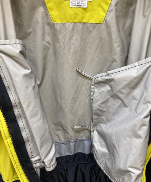 eYe COMME des GARCONS JUNYAWATANABE MAN（アイ コム デ ギャルソン ジュンヤ ワタナベ マン）eYe COMME des GARCONS JUNYAWATANABE MAN (アイ コム デ ギャルソン ジュンヤ ワタナベ マン) ARKAIR (アークエアー) フーデッドジャケット イエロー サイズ:XSの古着・服飾アイテム