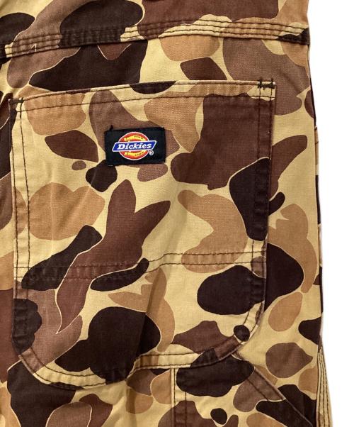 eYe COMME des GARCONS JUNYAWATANABE MAN（アイ コム デ ギャルソン ジュンヤ ワタナベ マン）eYe COMME des GARCONS JUNYAWATANABE MAN (アイ コム デ ギャルソン ジュンヤ ワタナベ マン) Dickies (ディッキーズ) カモ柄ペインターパンツ ベージュ サイズ:XSの古着・服飾アイテム