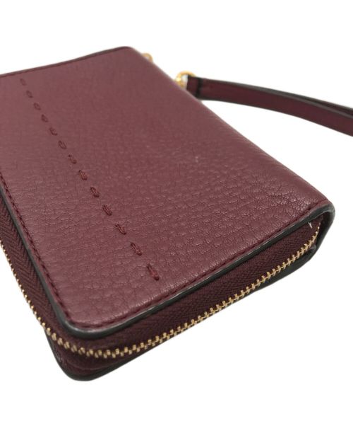 TORY BURCH（トリーバーチ）TORY BURCH (トリーバーチ) 2つ折り財布 ボルドーの古着・服飾アイテム