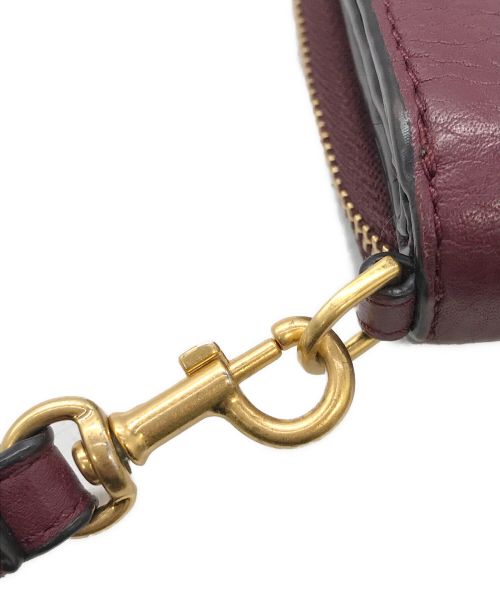 TORY BURCH（トリーバーチ）TORY BURCH (トリーバーチ) 2つ折り財布 ボルドーの古着・服飾アイテム