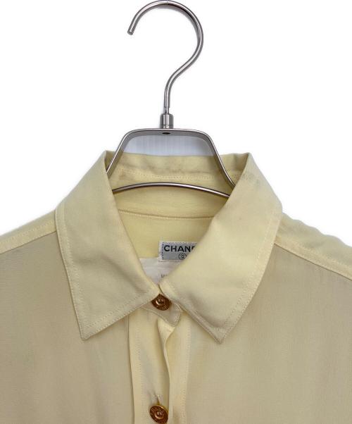 CHANEL（シャネル）CHANEL (シャネル) ロゴボタンシルクシャツ イエロー サイズ:34の古着・服飾アイテム