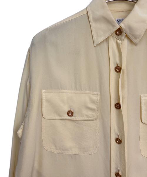 CHANEL（シャネル）CHANEL (シャネル) ロゴボタンシルクシャツ イエロー サイズ:34の古着・服飾アイテム