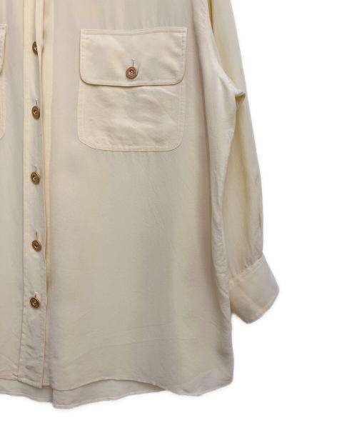 CHANEL（シャネル）CHANEL (シャネル) ロゴボタンシルクシャツ イエロー サイズ:34の古着・服飾アイテム