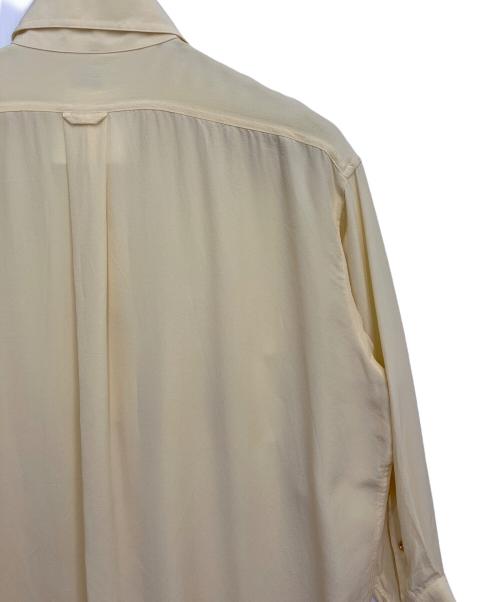 CHANEL（シャネル）CHANEL (シャネル) ロゴボタンシルクシャツ イエロー サイズ:34の古着・服飾アイテム